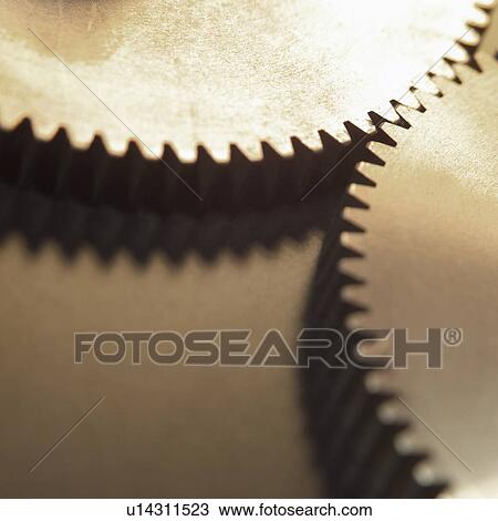 Close-up of two gears View Large Photo Image Stock Image - Close-up of two gears. Fotosearch