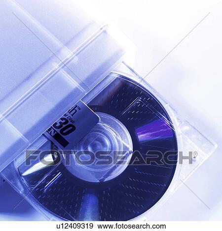 Stock Photo - Magneto Optical disk, close-up. Fotosearch
