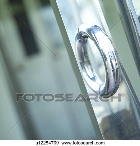 Metallic door knob, close-up View Large Photo Image Stock Photo - Metallic door knob, close-up. Fotosearch