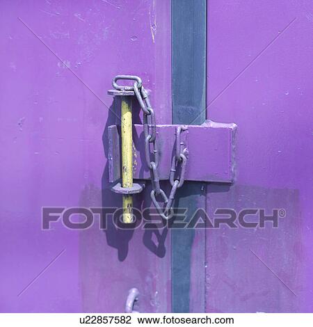 Stock Image - Purple cargo container, close-up. Fotosearch