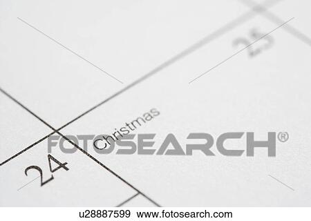 Close up of calendar displaying Christmas View Large Photo Image Stock Photo - Close up of calendar displaying Christmas. Fotosearch