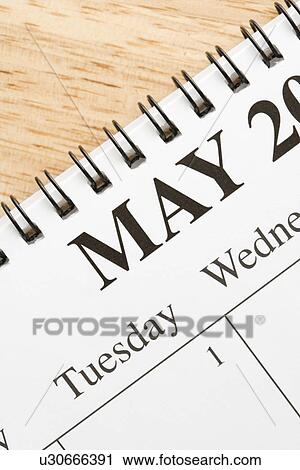Close up of spiral bound calendar displaying month of May View Large Photo Image Stock Image - Close up of spiral bound calendar displaying month of May. Fotosearch