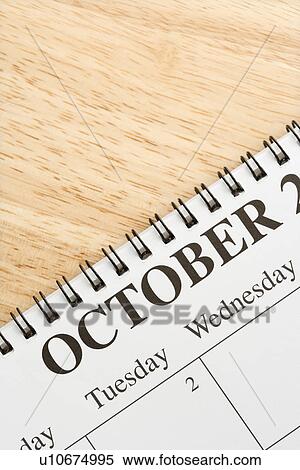 Close up of spiral bound calendar displaying month of October View Large Photo Image Stock Photography - Close up of spiral bound calendar displaying month of October. Fotosearch