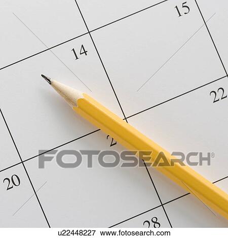 Pencil on top of a blank calendar View Large Photo Image Stock Photo - Pencil on top of a blank calendar. Fotosearch