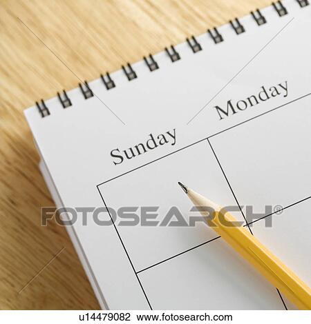 Pencil on top of a spiral bound calendar View Large Photo Image Stock Image - Pencil on top of a spiral bound calendar. Fotosearch