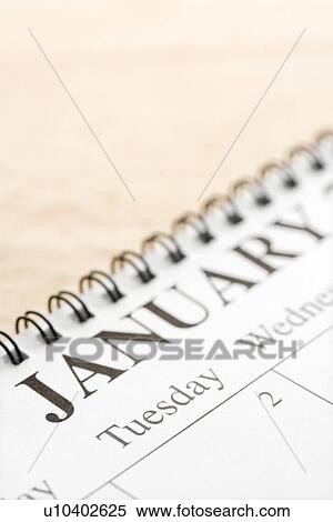 Spiral bound calendar displaying month of January View Large Photo Image Stock Photography - Spiral bound calendar displaying month of January. Fotosearch