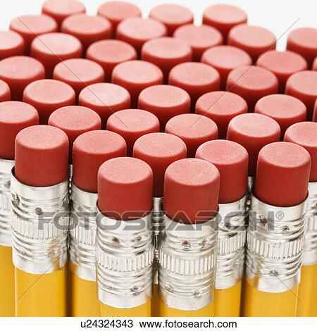 Stock Image - Close up of group of pencil erasers. Fotosearch