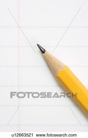 Close up of pencil on notebook paper View Large Photo Image Stock Image - Close up of pencil on notebook paper. Fotosearch