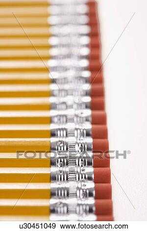 Stock Photo - Eraser ends of group of pencils lined up in an even row. Fotosearch
