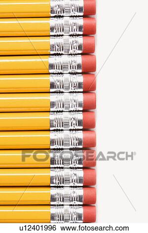 Stock Photograph - Eraser ends of group of pencils lined up in an even row.. Fotosearch
