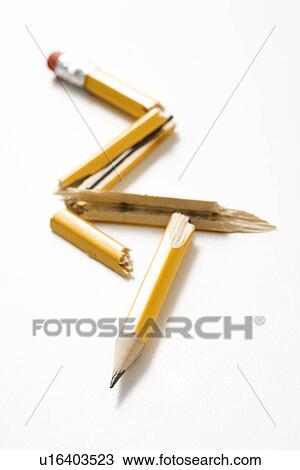 Stock Image - Pencil broken in several places. Fotosearch