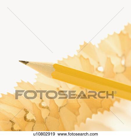 Stock Photo - Sharp pencil on spiral pencil shavings. Fotosearch