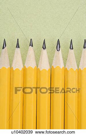 Sharp pencils arranged in an even row View Large Photo Image Stock Photo - Sharp pencils arranged in an even row. Fotosearch