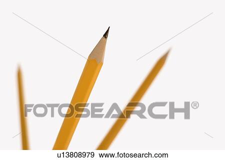 Stock Photo - Three pencils pointing in air with selective focus.. Fotosearch