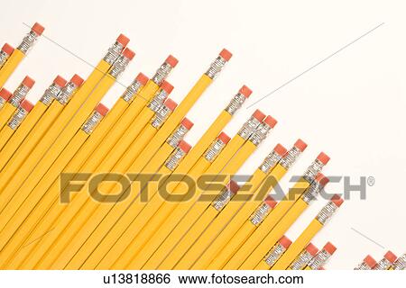 Stock Photograph - Uneven diagonal row of eraser ends of pencils. Fotosearch