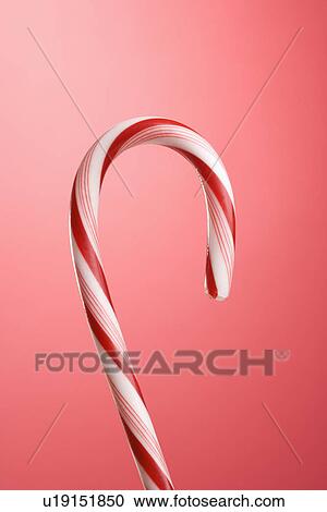 Still life of a candy cane. View Large Photo Image Stock Image - Still life of a candy cane.. Fotosearch