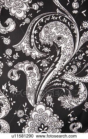 Close-up of black and white vintage fabric with flowers and paisley printed on polyester View Large Photo Image Stock Image - Close-up of black and white vintage fabric with flowers and paisley printed on polyester. Fotosearch