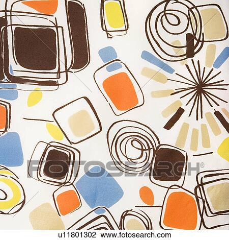 Stock Image - Close-up of colorful vintage fabric with abstract shapes and swirls printed on polyester. Fotosearch