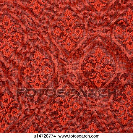 Close-up of red textural vintage fabric with repetitive shapes and designs View Large Photo Image Picture - Close-up of red textural vintage fabric with repetitive shapes and designs. Fotosearch