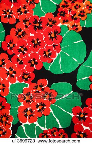 Close-up of vintage fabric with vibrant red geraniums and green leaves printed on polyester View Large Photo Image Stock Image - Close-up of vintage fabric with vibrant red geraniums and green leaves printed on polyester. Fotosearch