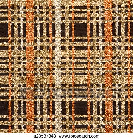 Stock Image - Close-up of woven vintage fabric with brown and gold crossbar pattern. Fotosearch