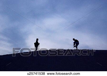 Stock Photo - desert, dune, safari, dubai, adventure, two. Fotosearch