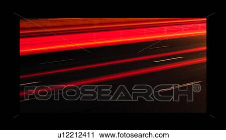Stock Image - dark, road, dubai, traffic, red, light, speed. Fotosearch