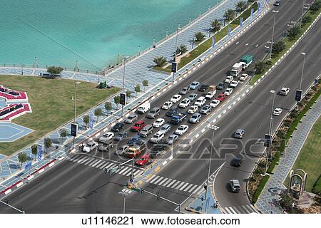 Stock Image - red, dhabi, traffic, road, corniche, light, abu. Fotosearch