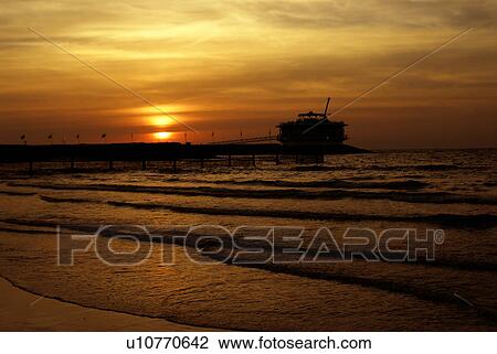 Stock Image - sunset, sunrise, rise, dubai, beach. Fotosearch