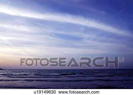 Stock Image - sunset, sunrise, rise, dubai, beach, blue, sky. Fotosearch