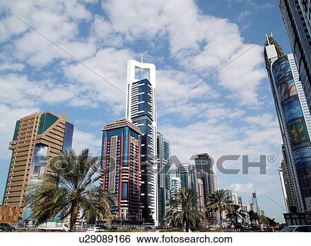 Stock Photograph - Dubai, sheikh, zayed, road, towers, sky, scrapper. Fotosearch