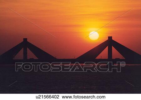 Stock Image - bahrain, bridge, sunset, sunrise. Fotosearch