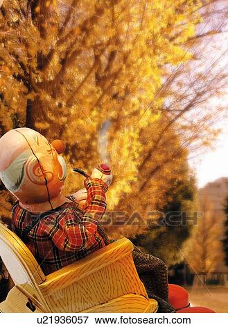 Toy Doll, Grandfather Smoking, Side View, Vertical, Color Image, Photography, Differential Focus View Large Illustration Stock Illustration - Toy Doll, Grandfather Smoking, Side View, Vertical, Color Image, Photography, Differential Focus. Fotosearch