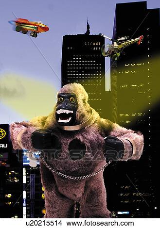 Stock Illustration - Toy Doll, King Kong and Buildings, Front View, Blurred Motion. Fotosearch