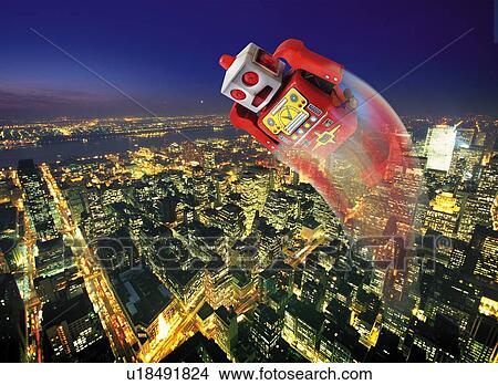 Stock Illustration - Toy Doll, Robot Flying, High Angle View, Blurred Motion, Long Exposure. Fotosearch