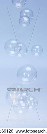 Stock Photograph - Bubbles with blue background. Fotosearch