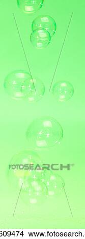 Picture - Bubbles with green background. Fotosearch