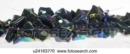 Stock Image - Pile of plastic decorations close up. Fotosearch