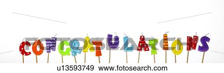 Stock Photo - Candle letters spelling out congratulations. Fotosearch