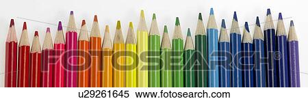 Coloured pencils in a row View Large Photo Image Stock Photography - Coloured pencils in a row. Fotosearch