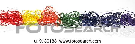 Coloured threads in a row View Large Photo Image Stock Photo - Coloured threads in a row. Fotosearch