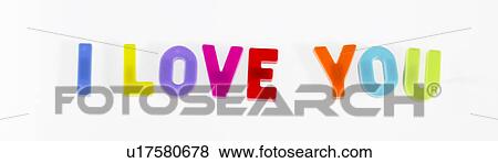 Stock Photo - Plastic letter magnets spelling out I love you. Fotosearch