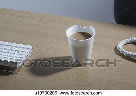 A Styrofoam cup of tea with a chunk bitten out of it. View Large Photo Image Stock Photograph - A Styrofoam cup of tea with a chunk bitten out of it.. Fotosearch