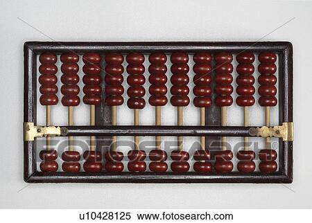 Abacus sitting on a tabletop. View Large Photo Image Stock Photography - Abacus sitting on a tabletop.. Fotosearch