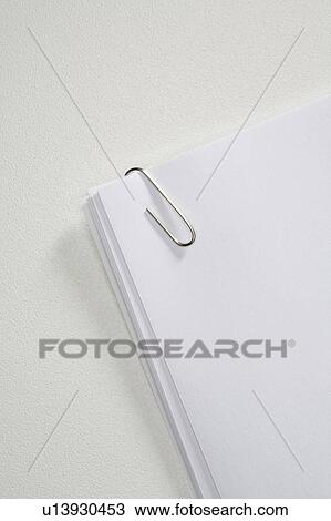 Papers held together with a paperclip. View Large Photo Image Stock Image - Papers held together with a paperclip.. Fotosearch