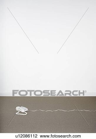Telephone sitting on the carpet. View Large Photo Image Stock Image - Telephone sitting on the carpet.. Fotosearch