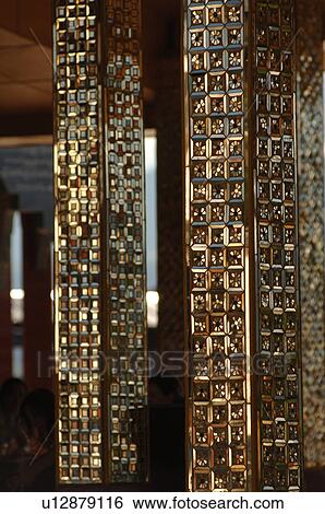 Golden etched pillars in Buddhist Temple View Large Photo Image Stock Photograph - Golden etched pillars in Buddhist Temple. Fotosearch