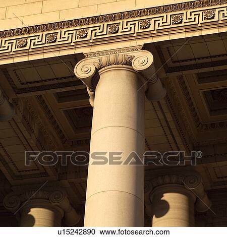 Low angle view of a stone carved column View Large Photo Image Stock Image - Low angle view of a stone carved column. Fotosearch