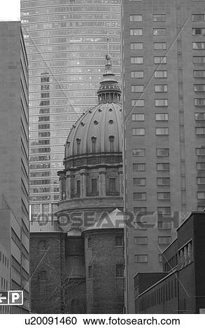 Ancient historical building between two skyscrapers in Montreal, Canada View Large Photo Image Stock Image - Ancient historical building between two skyscrapers in Montreal, Canada. Fotosearch