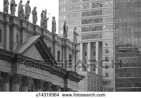Statues on top of a building in Montreal, Canada View Large Photo Image Picture - Statues on top of a building in Montreal, Canada. Fotosearch